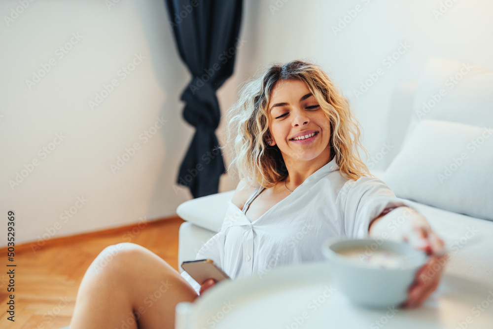 Woman having breakfast at home Woman having breakfast at home