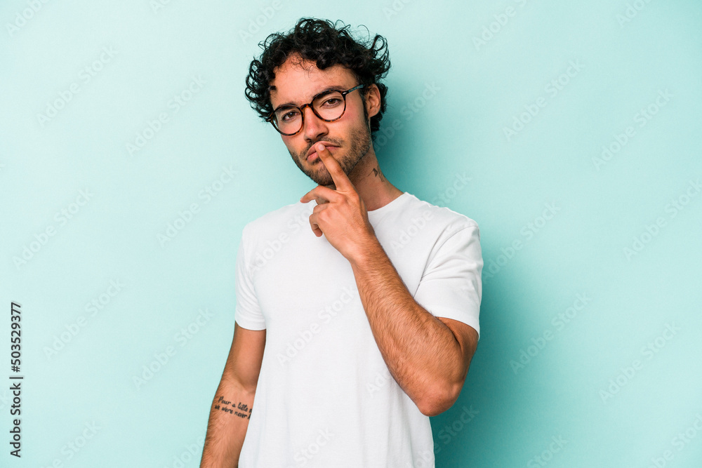 Young caucasian man isolated on white background thinking and looking up, being reflective, contemplating, having a fantasy. Young caucasian man isolated on white background thinking and looking up, being reflective, contemplating, having a fantasy.