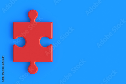 Red blank jigsaw puzzle piece on blue background. Copy space. 3d render