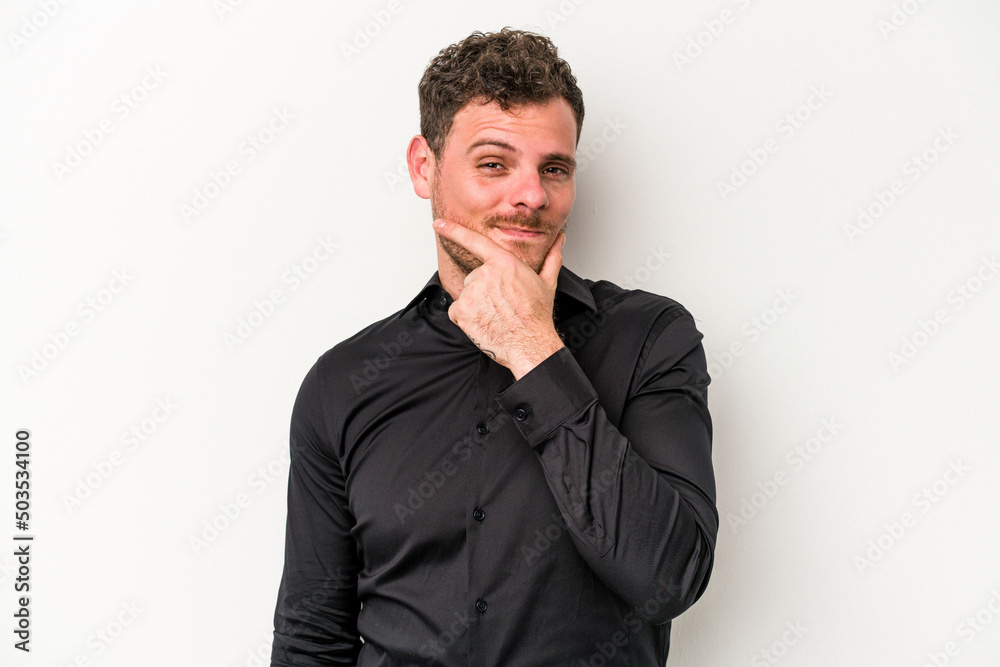 Young caucasian man isolated on white background contemplating, planning a strategy, thinking about the way of a business. Young caucasian man isolated on white background contemplating, planning a strategy, thinking about the way of a business.
