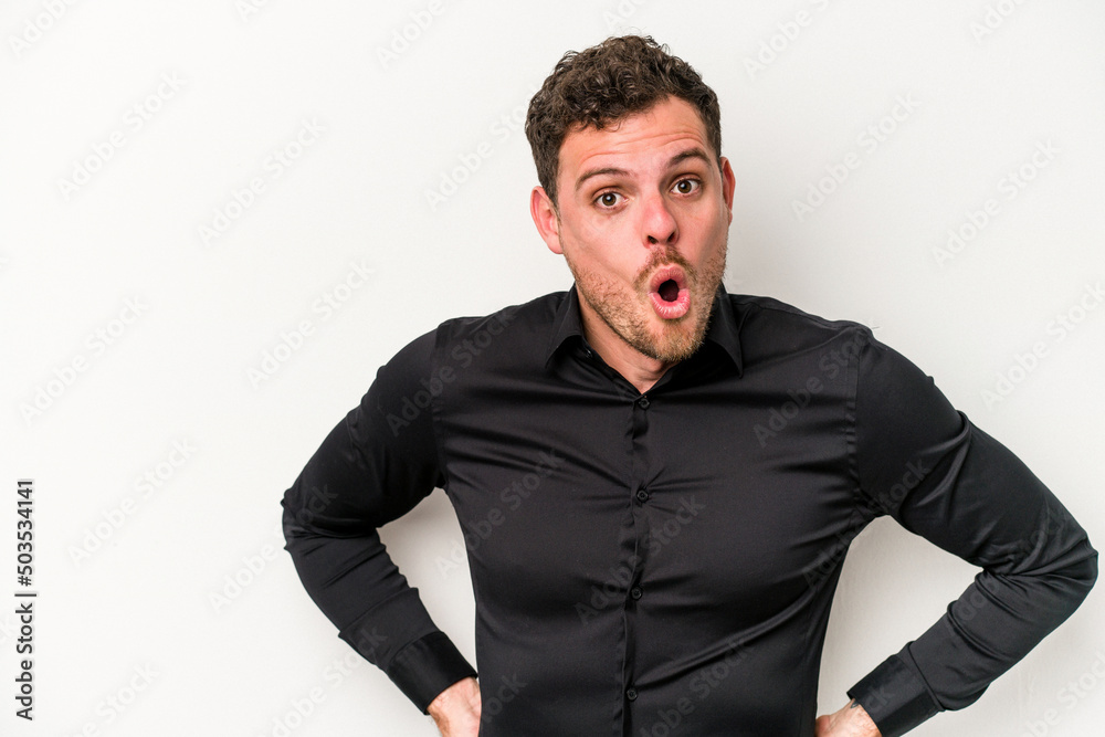 Young caucasian man isolated on white background being shocked because of something she has seen. Young caucasian man isolated on white background being shocked because of something she has seen.