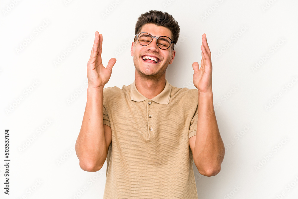 Young caucasian man isolated on white background joyful laughing a lot. Happiness concept. Young caucasian man isolated on white background joyful laughing a lot. Happiness concept.