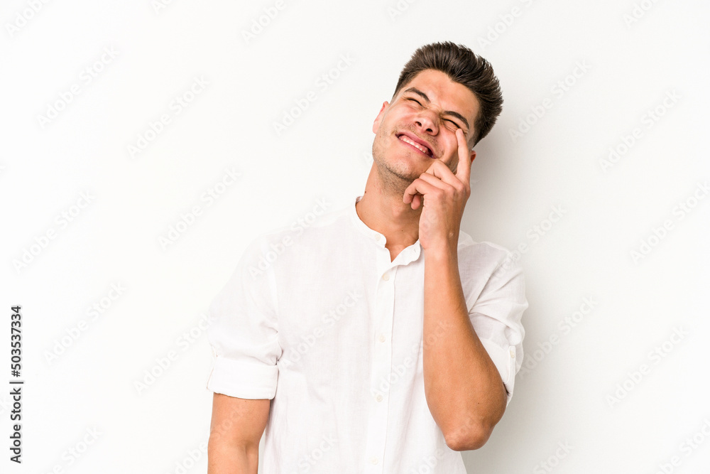Young caucasian man isolated on white background crying, unhappy with something, agony and confusion concept. Young caucasian man isolated on white background crying, unhappy with something, agony and confusion concept.