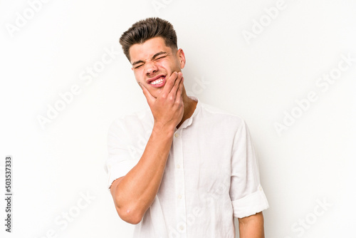 Young caucasian man isolated on white background having a strong teeth pain, molar ache.