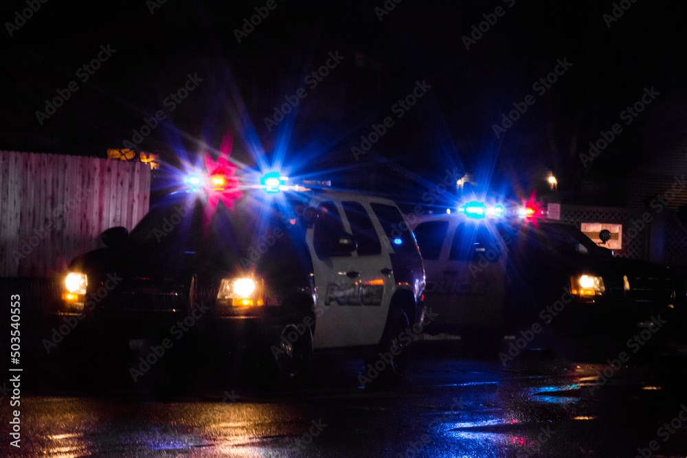 Ταπετσαρία Police cruisers vehicles with flashing lights at vehicle accident on cold wet da
