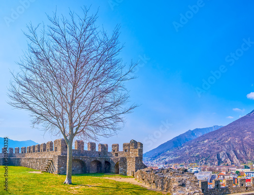 The medieval walls of Castelgrande fortress of .Bellinzona, Switzerland photo