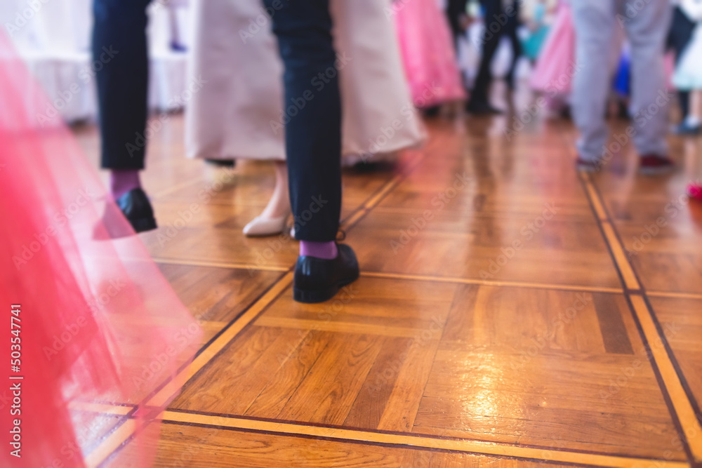 Couples dance on the historical costumed ball in historical dresses, classical ballroom dancers dancing, waltz, quadrille and polonaise in palace interiors on a wooden floor, charity event Couples dance on the historical costumed ball in historical dresses, classical ballroom dancers dancing, waltz, quadrille and polonaise in palace interiors on a wooden floor, charity event