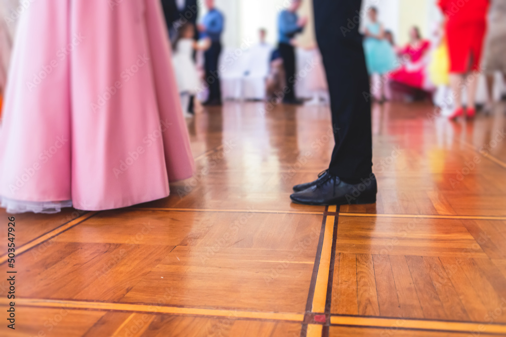 Couples dance on the historical costumed ball in historical dresses, classical ballroom dancers dancing, waltz, quadrille and polonaise in palace interiors on a wooden floor, charity event Couples dance on the historical costumed ball in historical dresses, classical ballroom dancers dancing, waltz, quadrille and polonaise in palace interiors on a wooden floor, charity event