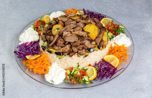 Middle Eastern food culture, Turkish cuisine; type of pilaf, pilaf with meat and vegetables, Turkish name; Maklube photo