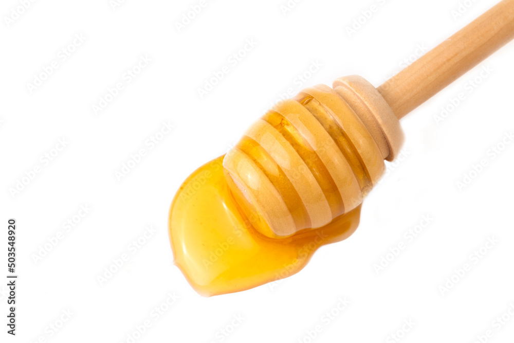 Honey with honey dipper isolated on white background. Honey with honey dipper isolated on white background.