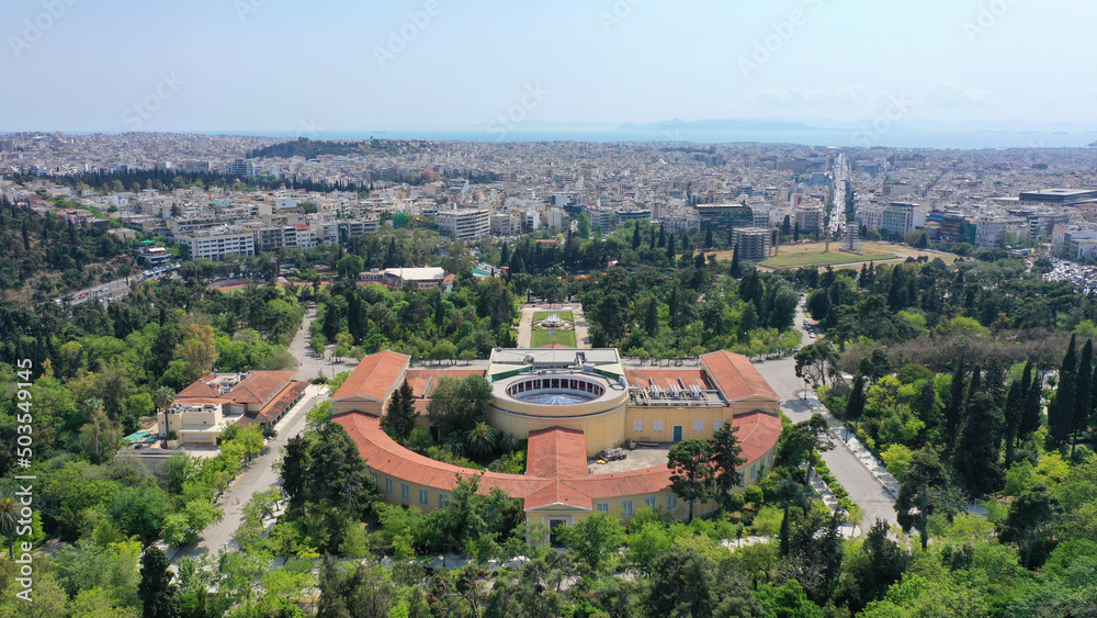 Obraz premium Aerial photo taken by drone of iconic public Zappeio hall used for events and whole Athens cityscape at the background, Attica, Greece