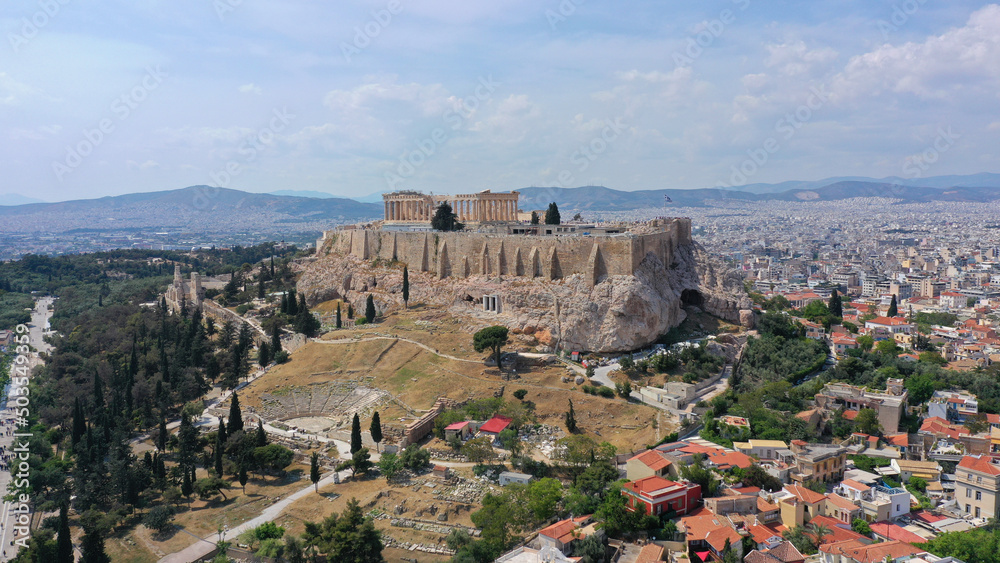 Aerial drone photo of iconic Acropolis hill and the Parthenon a Unesco World Heritage Masterpiece of ancient times, Athens historic centre, Attica, Greece