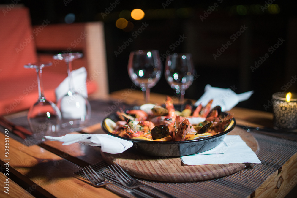 Fresh Paella dish on the table
