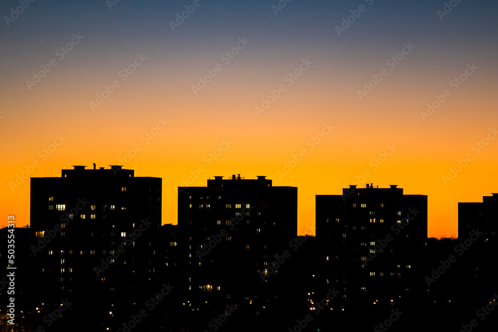A residential area of the city at dusk.