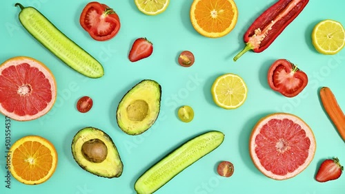 Wallpaper Mural Making creative pattern with fresh ripe sliced fruits on cyan background. Stop motion flat lay Torontodigital.ca