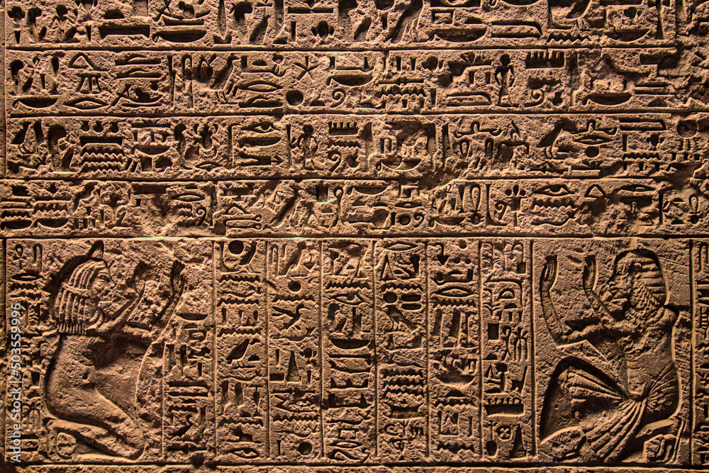Stone inscribed with egyptian hieroglyphs and with two figures Stone inscribed with egyptian hieroglyphs and with two figures