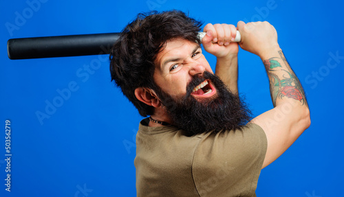 Картината върху платно Angry bearded man swinging baseball bat
