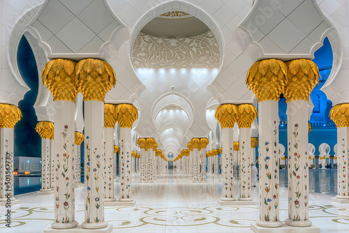 Detailed exterior photo of an illuminated external hallway of the Sheik Zayed Mosque in Abu Dhabi, United Arab Emirates