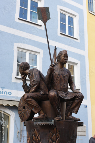 denkmal Brunnen mit dem Müller, dem Drescher und dem Bäcker in füssen am Schrannenplatz, bayern, deutschland photo