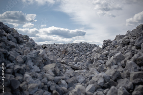 A commercial gravel pit of crushed stone for construction and road works. Gravel extraction