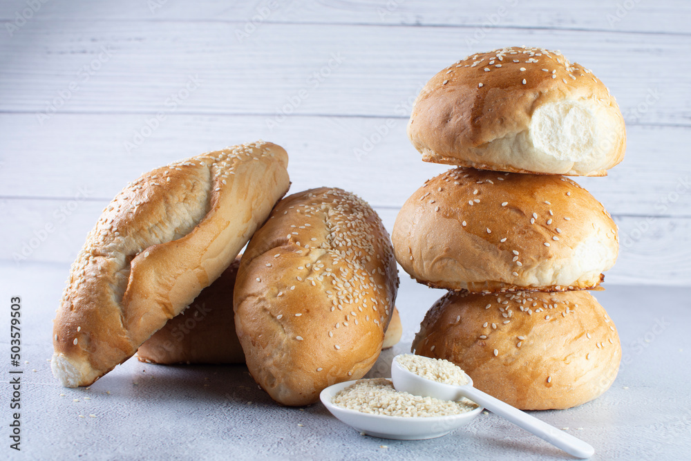 Traditional corn and sesame bread, displayed on gray background Traditional corn and sesame bread, displayed on gray background