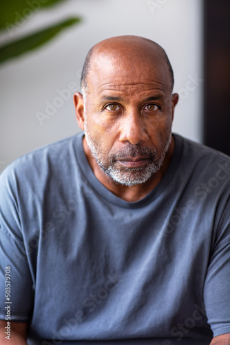 Mature African American man with a serious look on his face.