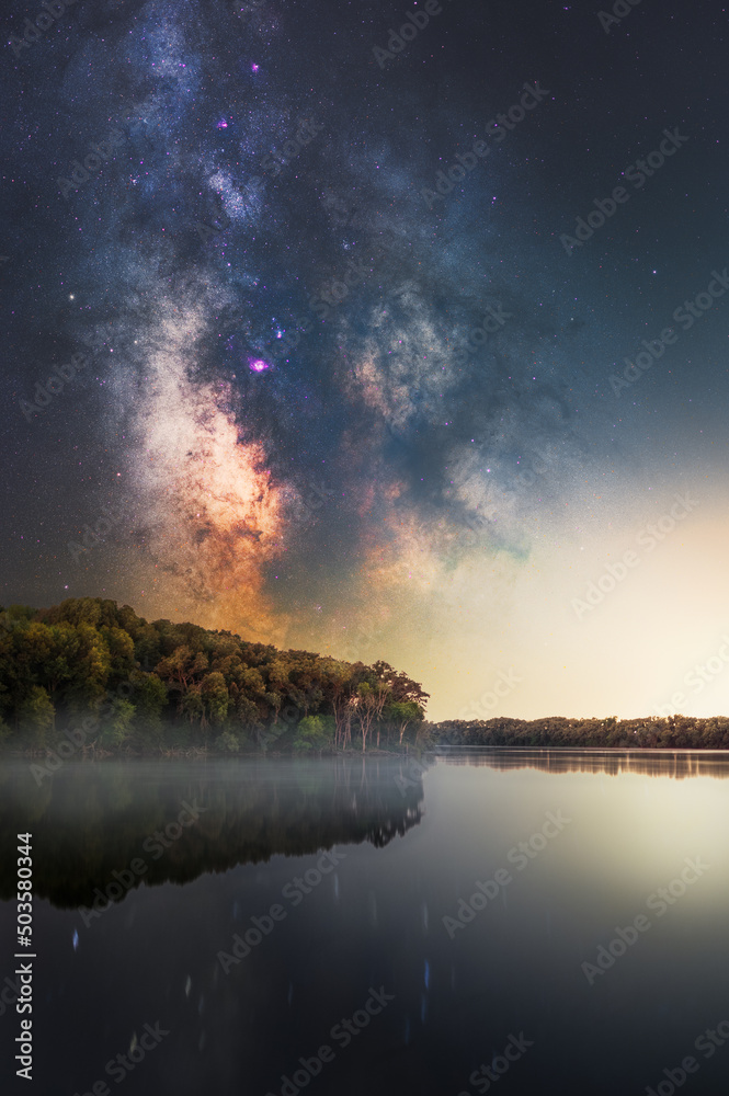 milky way above the lake in the midwest