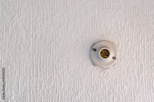 Instalación para poner el foco en la pared blanca con textura, socket, portalámpara photo