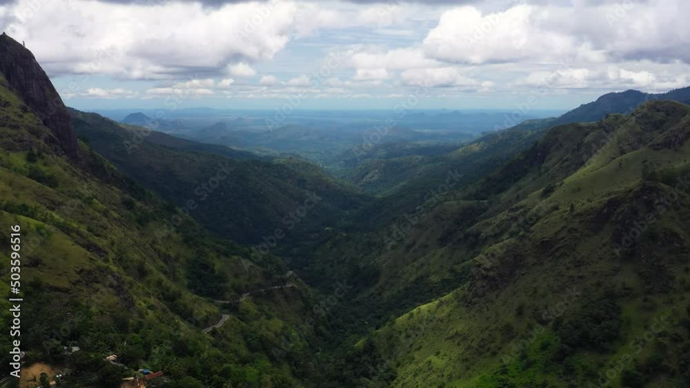 Aerial view of Mountains and green hills. Slopes of mountains with evergreen vegetation. Ella Rock, Sri Lanka. Aerial view of Mountains and green hills. Slopes of mountains with evergreen vegetation. Ella Rock, Sri Lanka.