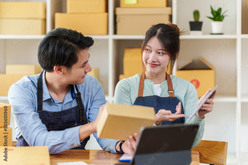 Happy bussiness Startup small business with parcel box for deliver to customer and working together at home. Happy bussiness Startup small business with parcel box for deliver to customer and working together at home.