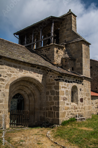 Vertical shot of an old building in a provincial village in Franc