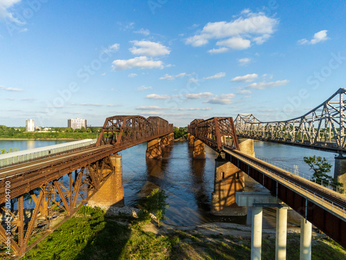 Drone view of the Memphis Arkansas Memorial Bridge,  Frisco Bridge and Harahan Bridge on Interstate 55 crossing the Mississippi River From Arkansas to Tennessee.