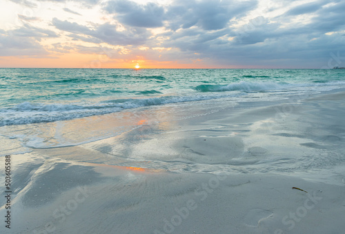 Reflection of Sunset on North Lido Key Beach, Sarasota, Florida, USA photo