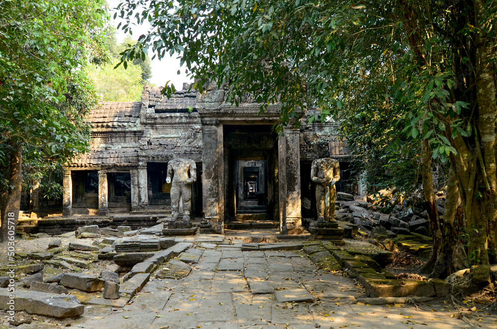 Cambodia, ANGKOR Temple complex, Preah Khan temple (Preah Khan Kampongsvai) in the rainforest, Entrance to the Cambodian temple, columns, headless Statues, Religious structure of the Angkor period