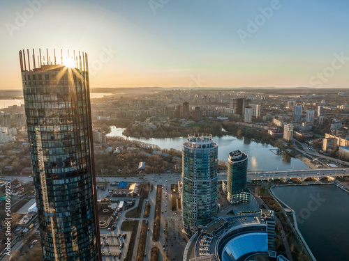 Yekaterinburg aerial panoramic view in spring at sunset. Yekaterinburg city and pond in spring or autumn.