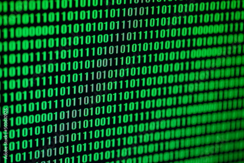 A stream of binary matrix code on the screen. numbers of the computer matrix. The concept of coding, hacker or mining of crypto-currency bitcoin. Vector illustration.