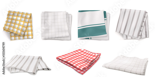 Foto Folded napkins, kitchen towels or tablecloths in top and angle view