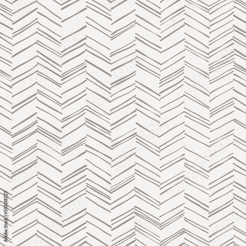 Doodle herringbone seamless pattern. Vector hand drawn striped background with scribble lines. Gray color. For fabric, wrapping, invitations, card, scrapbooking or wallpaper.