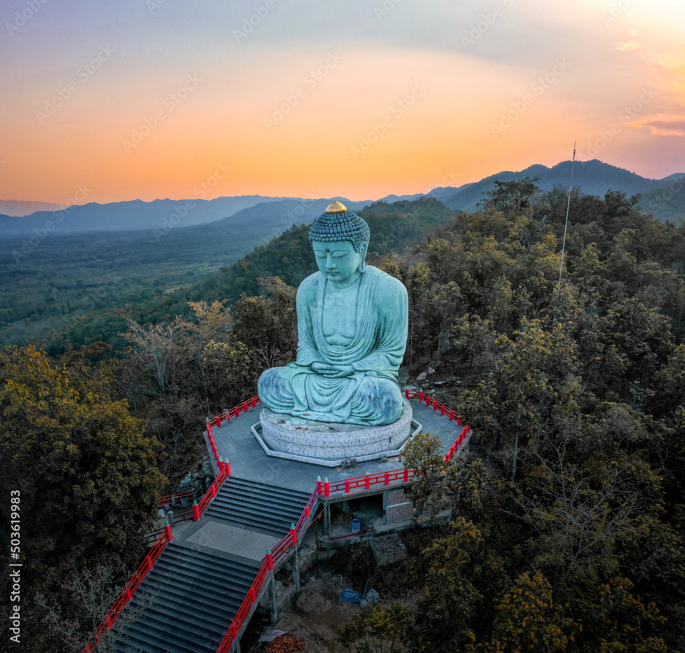 Fototapeta premium Aerial view of Wat Doi Prachan Mae Tha or Wat Phra That Doi Phra Chan in Lampang, Thailand