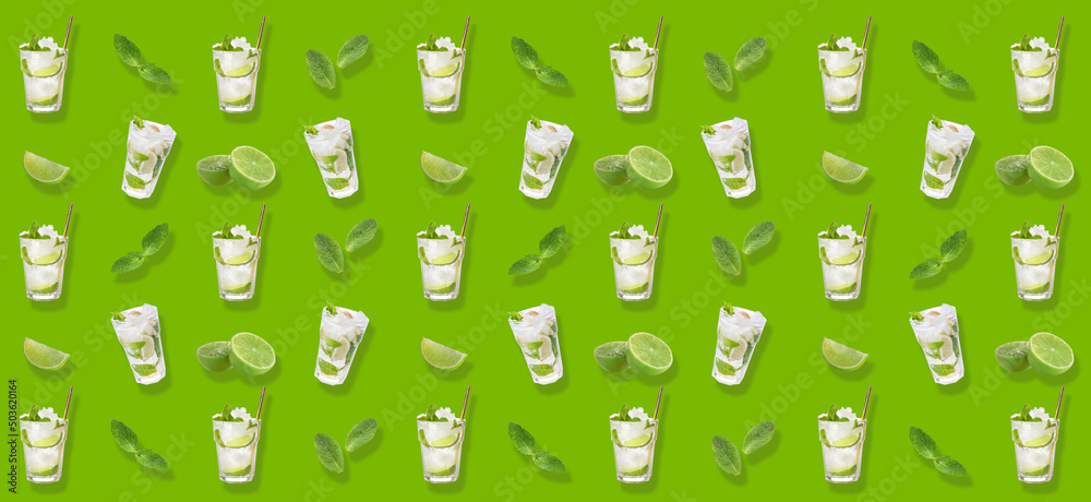 Glasses of fresh mojito with lime and mint on green background - obrazy, fototapety, plakaty 
