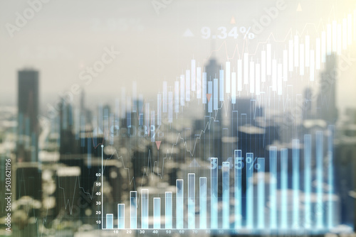 Multi exposure of virtual abstract financial diagram on blurry office buildings background  banking and accounting concept