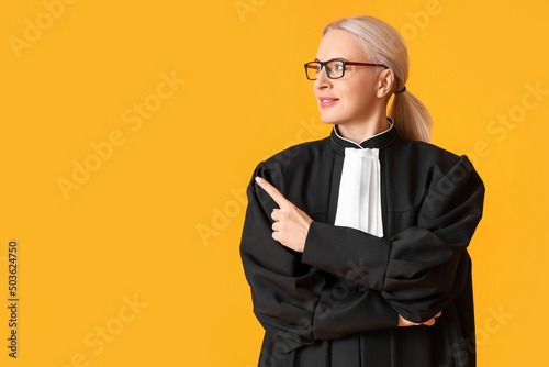 Mature female judge in robe...
