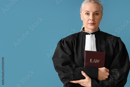 Mature female judge in robe...