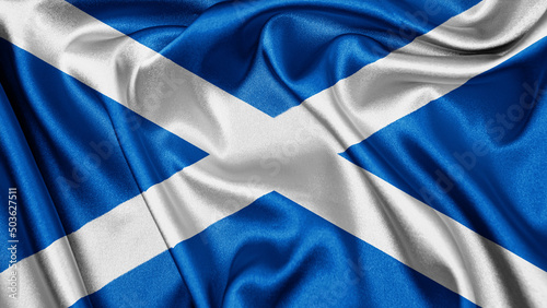 Close up realistic texture fabric textile silk satin flag of Scotland waving fluttering background. National symbol of the country. 30th of November, Happy Day concept 