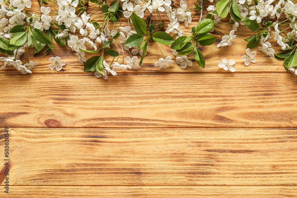 Blooming spring branches on wooden background Blooming spring branches on wooden background