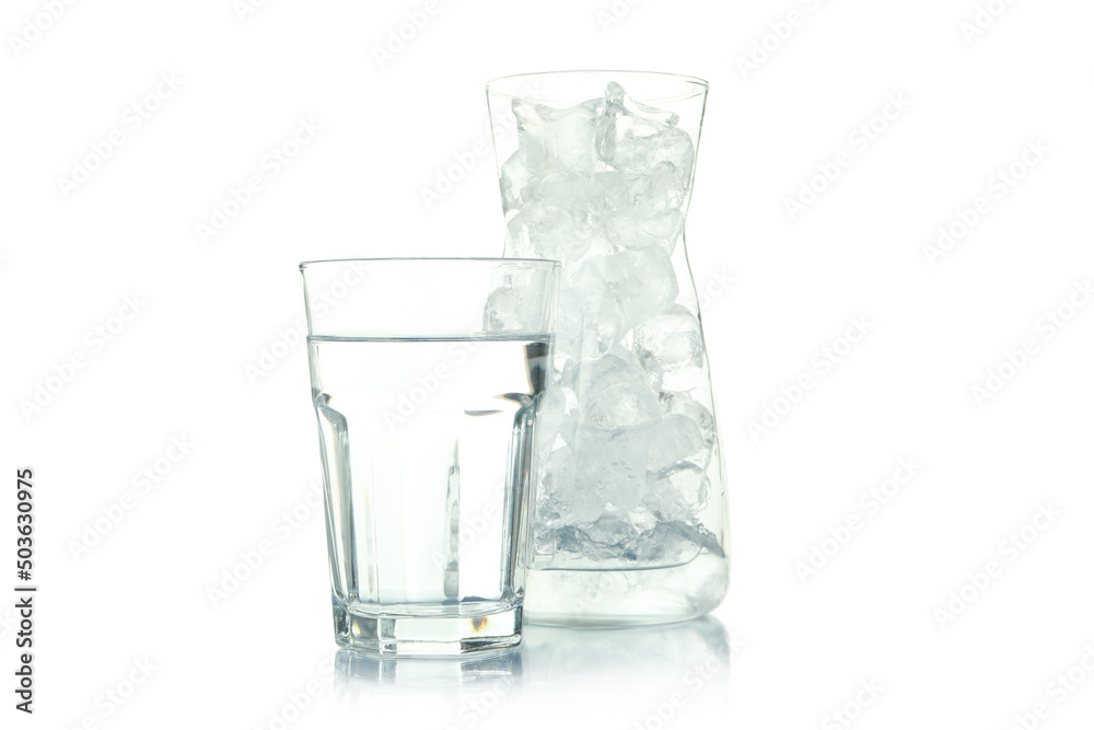 Jug with ice and glass of water isolated on white background Jug with ice and glass of water isolated on white background