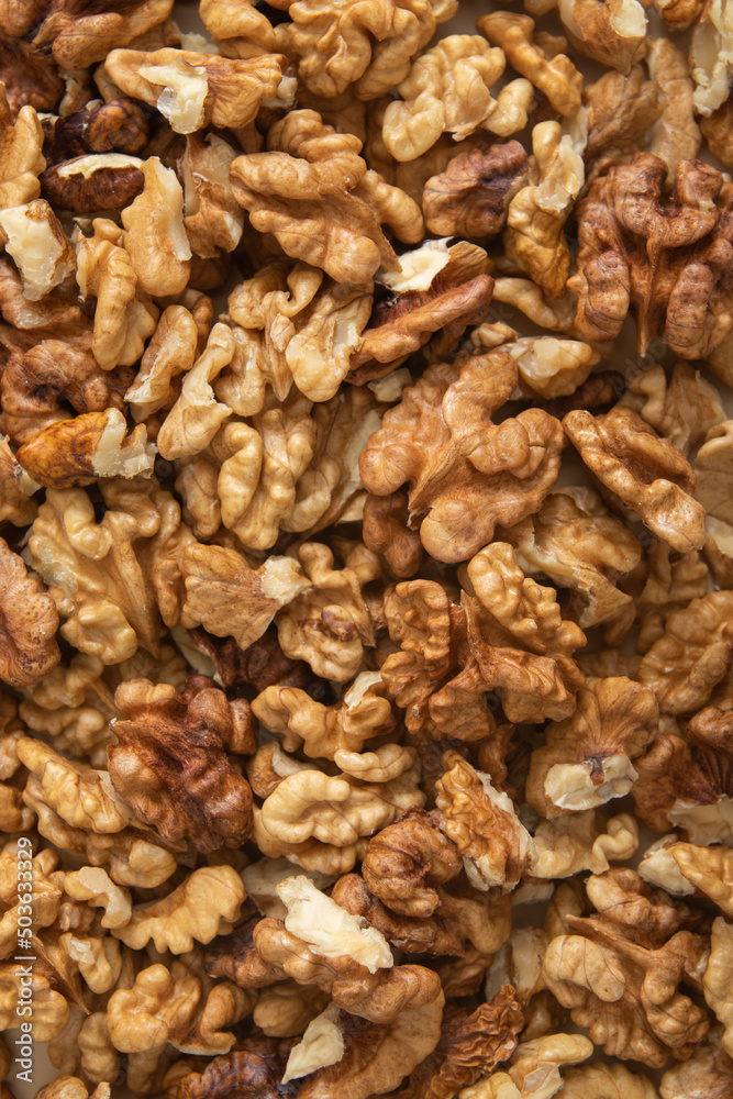Peeled walnuts top view. Food abstract background with nuts Peeled walnuts top view. Food abstract background with nuts