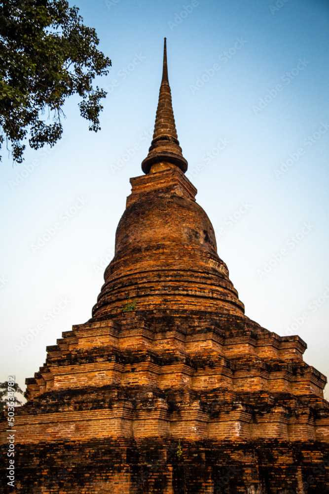 Fototapeta premium Wat Mahathat buddha and temple in Sukhothai Historical Park