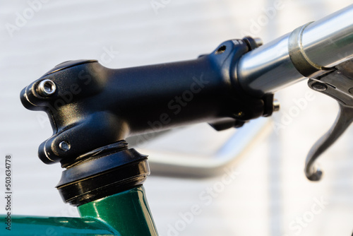 close up stem of fixed gear bike, old vintage bicycle photo