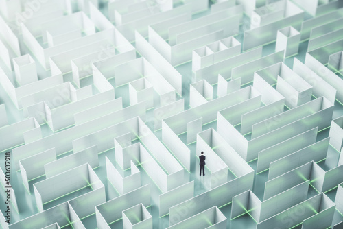 Obraz na plátne Businessman in creative light blue maze background.